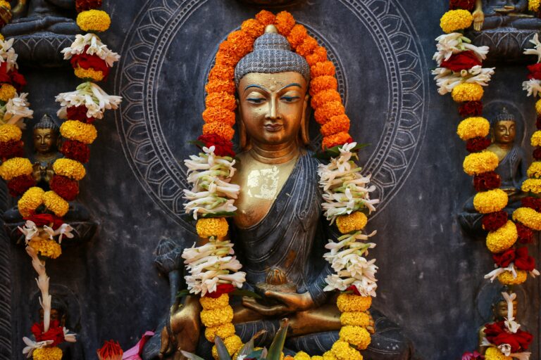 Buddha with flower offerings
